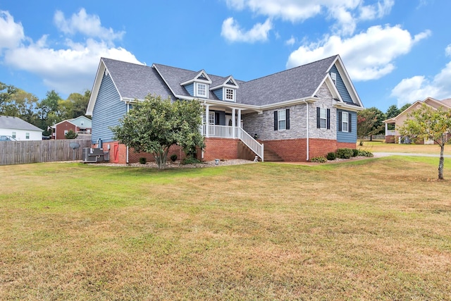 view of front of home with a front lawn and covered porch