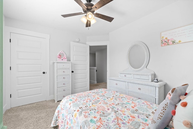 bedroom featuring ceiling fan and light carpet