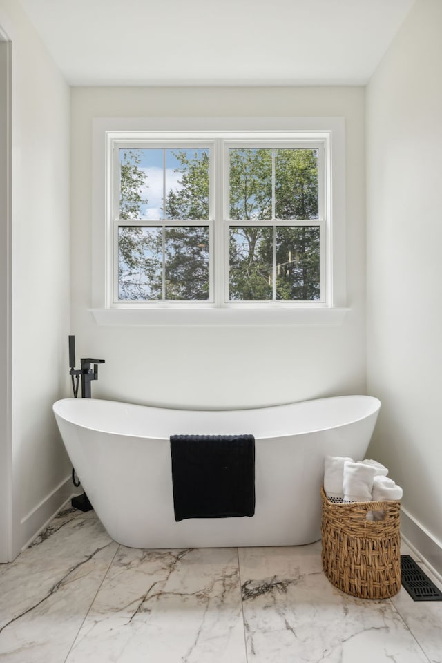 bathroom with tile patterned flooring