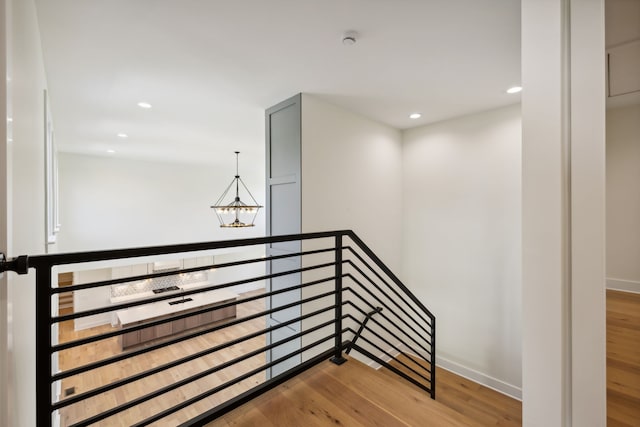 staircase featuring hardwood / wood-style floors