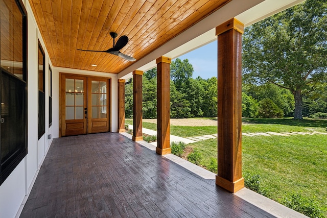 view of patio with french doors and ceiling fan