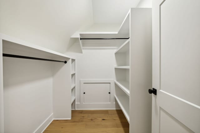 walk in closet featuring light wood-type flooring