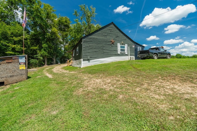 view of home's exterior featuring a lawn