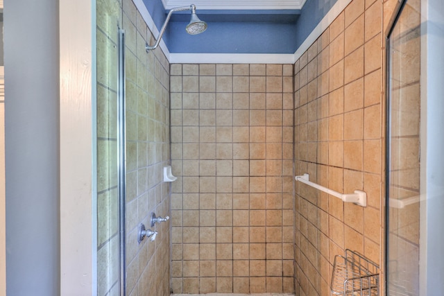 bathroom with tiled shower