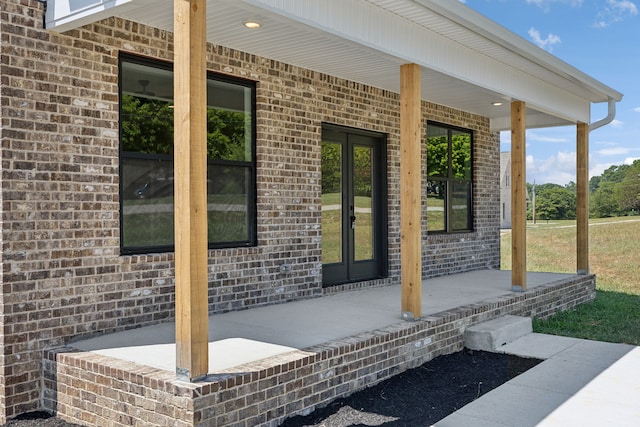 view of patio / terrace featuring covered porch and french doors