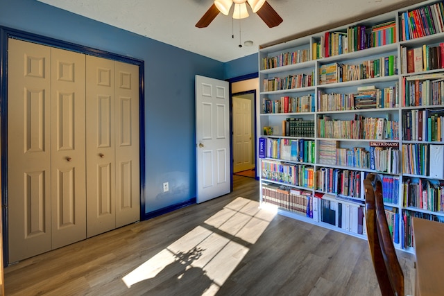 living area with wood-type flooring