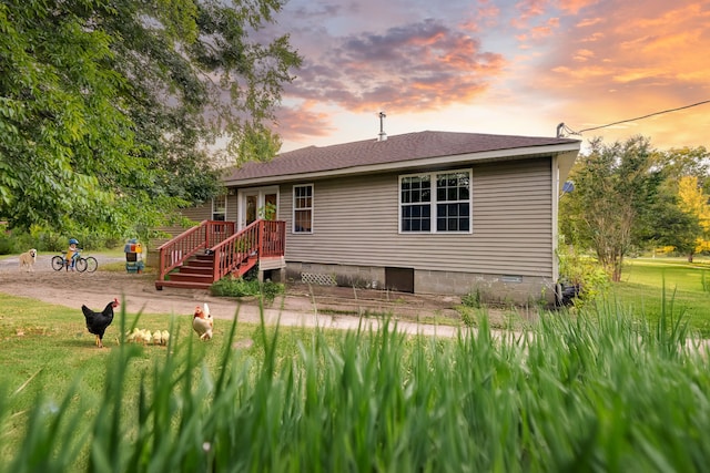 exterior space featuring a lawn