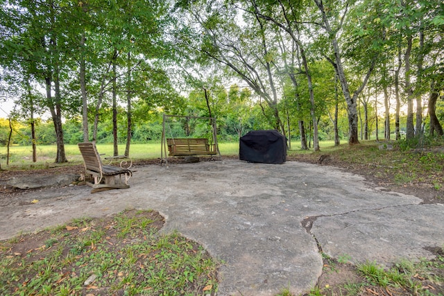 view of patio featuring a grill