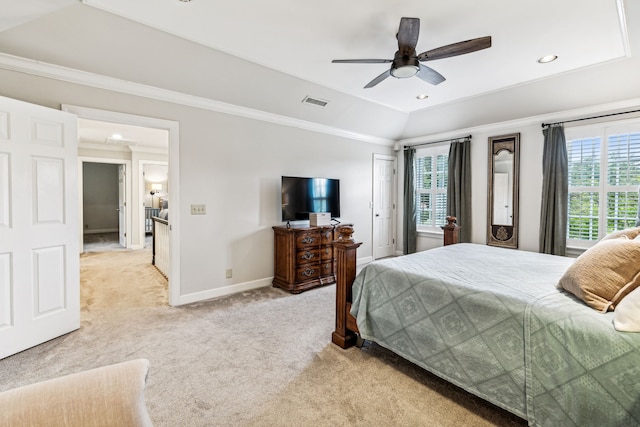 carpeted bedroom featuring crown molding, vaulted ceiling, and ceiling fan