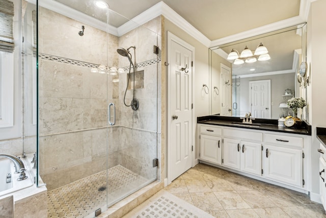 bathroom with tile patterned floors, separate shower and tub, ornamental molding, and vanity