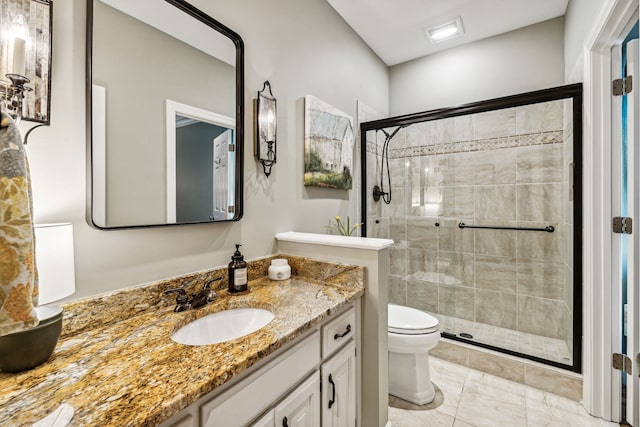 bathroom featuring an enclosed shower, tile patterned floors, toilet, and vanity