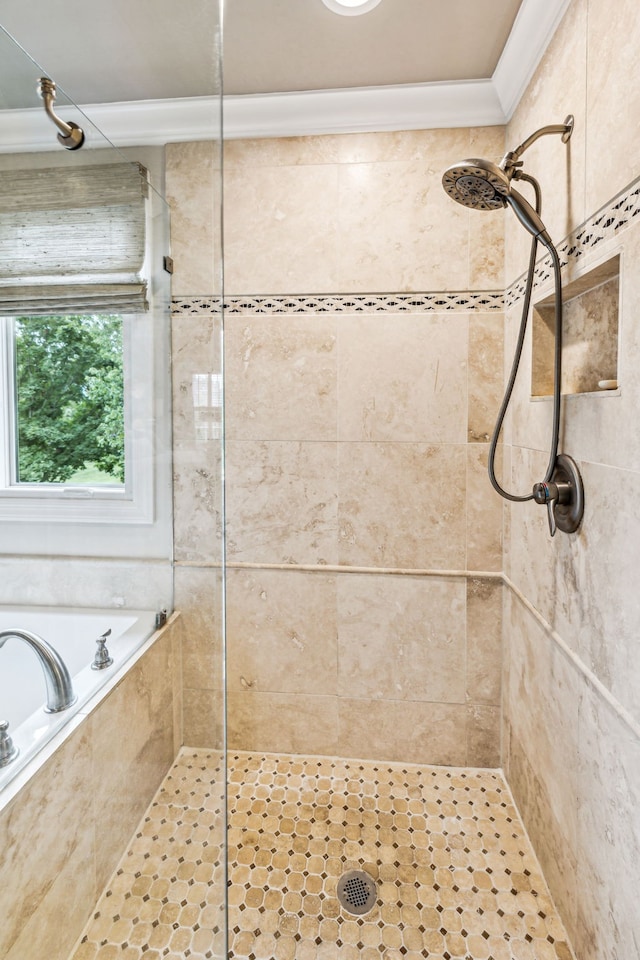 bathroom with tile patterned flooring, ornamental molding, and plus walk in shower