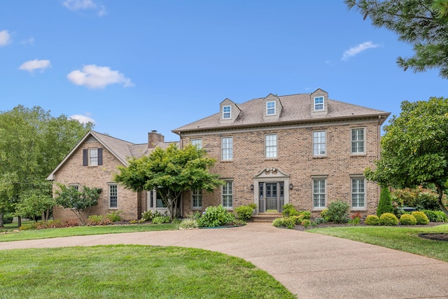 colonial house with a front yard