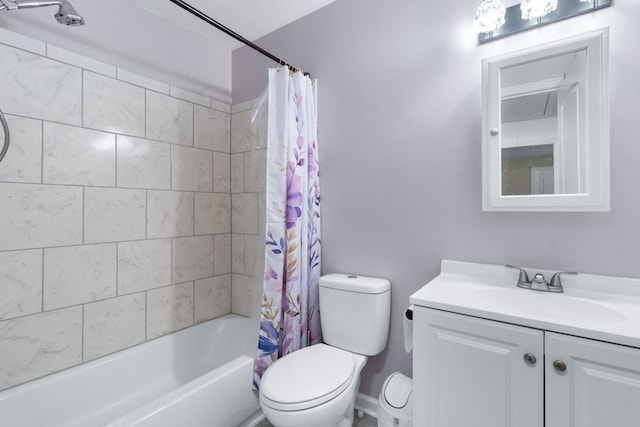 full bathroom with toilet, shower / bath combo with shower curtain, vanity, and a textured ceiling