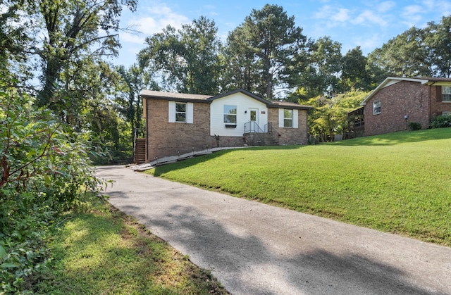 view of front of property with a front lawn