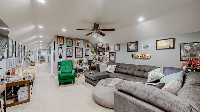 living room with light colored carpet, lofted ceiling, and ceiling fan