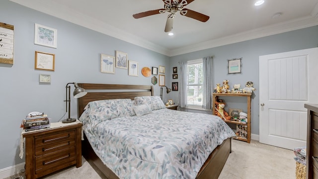 bedroom with ceiling fan, crown molding, and light carpet