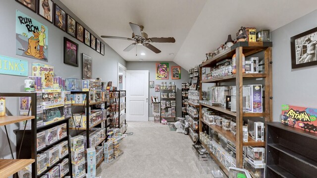 interior space with ceiling fan