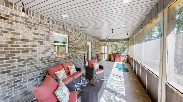 1019 Parker Rd, Kingston Springs, TN 37082 - sunroom / solarium featuring an outdoor living space and brick wall