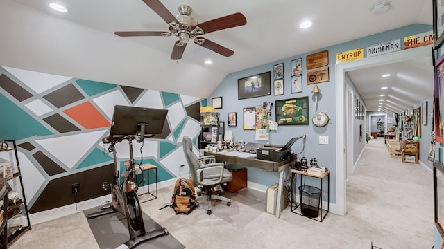 workout area featuring ceiling fan, vaulted ceiling, and carpet