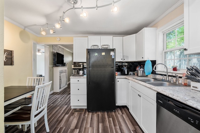 kitchen featuring sink, black fridge, stainless steel dishwasher, track lighting, and white cabinets