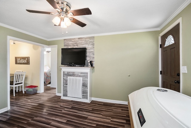 interior space with ceiling fan, hardwood / wood-style floors, and ornamental molding