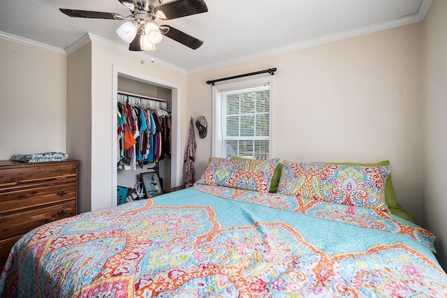 bedroom featuring a closet, ceiling fan, and ornamental molding