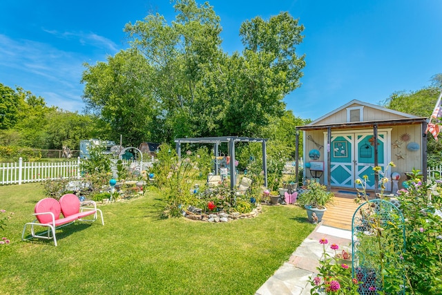 view of yard with a storage unit