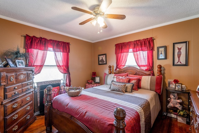 bedroom with ceiling fan, ornamental molding, and wood-type flooring