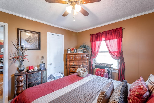 bedroom with ceiling fan, a textured ceiling, and crown molding