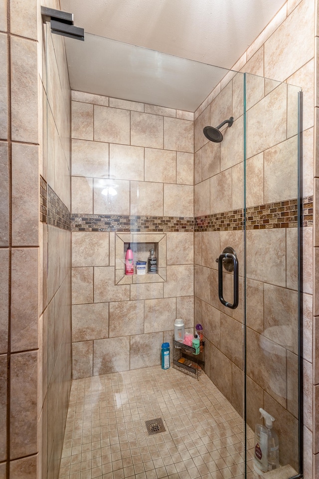 bathroom featuring walk in shower