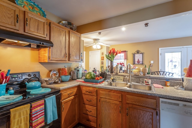 kitchen featuring dishwasher, sink, kitchen peninsula, ceiling fan, and black range with electric cooktop