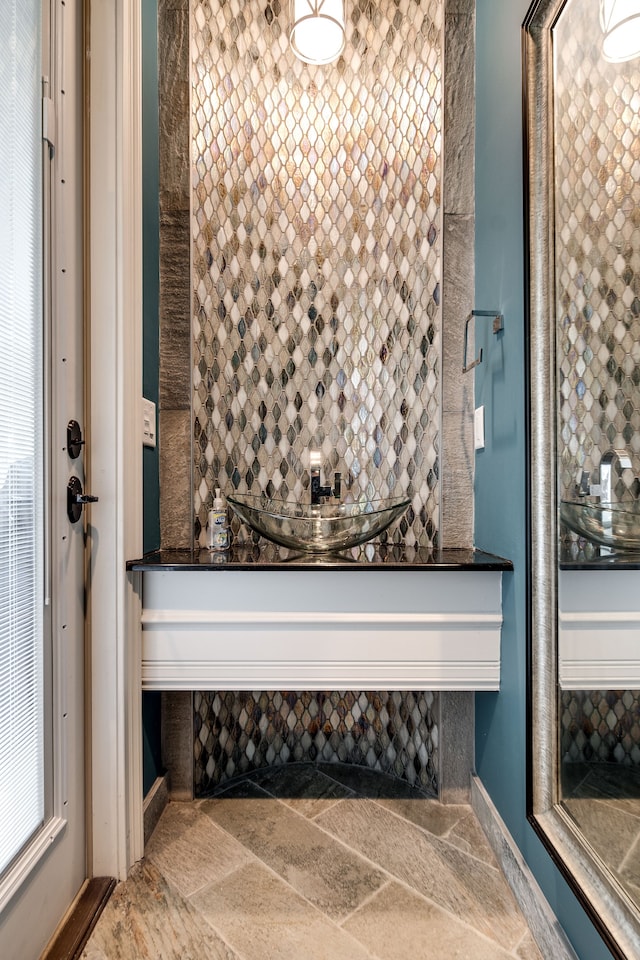 bathroom featuring tile patterned flooring and sink