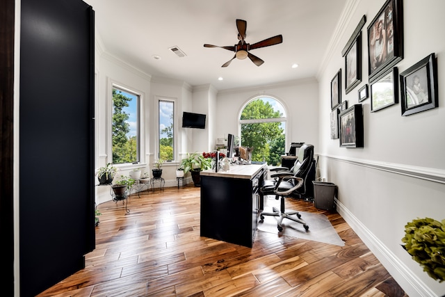 office space featuring ceiling fan, hardwood / wood-style floors, and ornamental molding