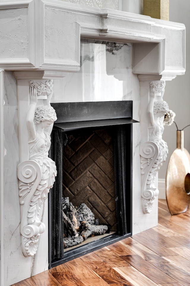 interior details featuring hardwood / wood-style floors