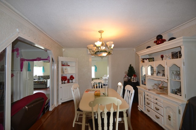 dining room with a wealth of natural light, a notable chandelier, crown molding, and dark wood-type flooring