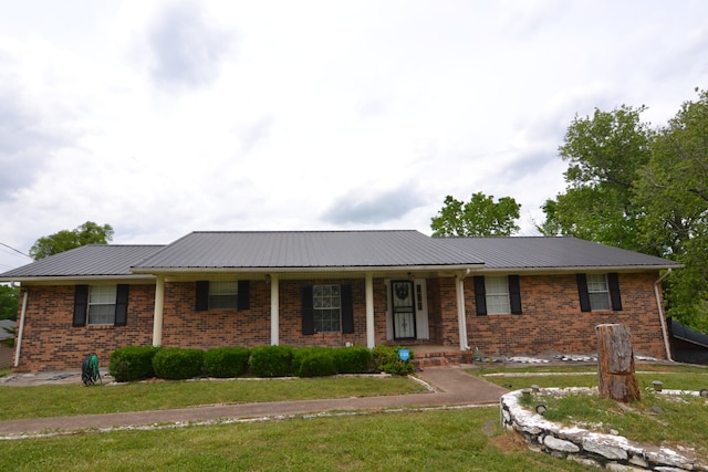 single story home with a front lawn and a porch