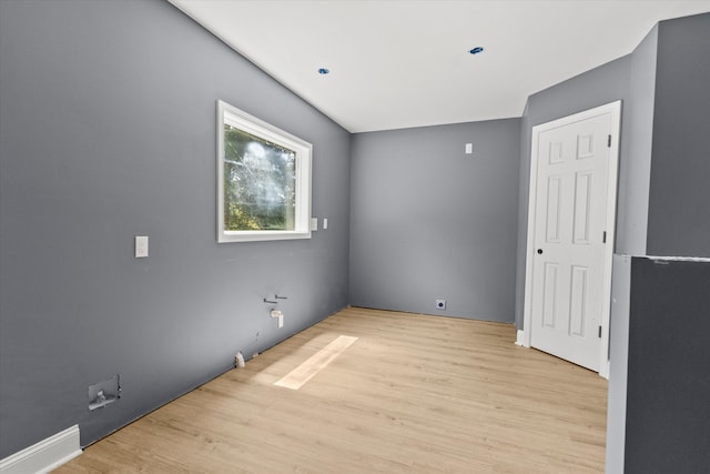 unfurnished room featuring light hardwood / wood-style floors