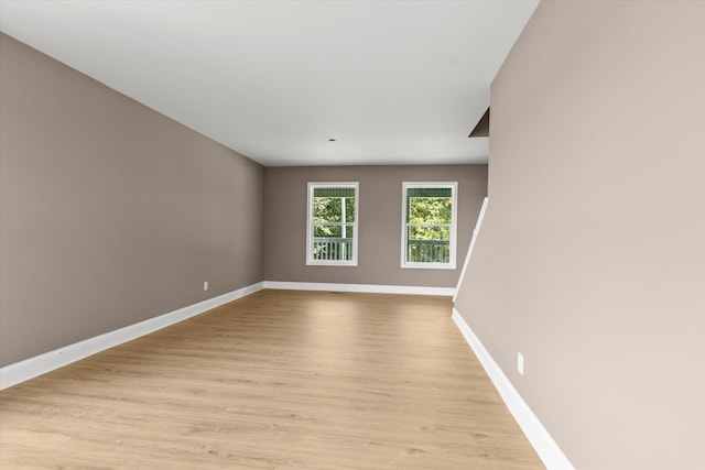 unfurnished room featuring light hardwood / wood-style flooring