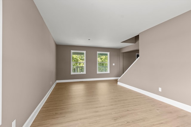 unfurnished room featuring light wood-type flooring