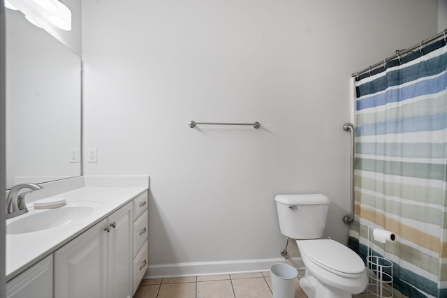 full bathroom with a shower with curtain, toilet, vanity, tile patterned flooring, and baseboards