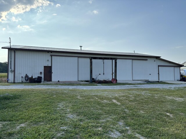 view of outdoor structure featuring a yard