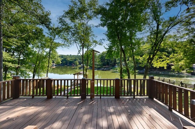 deck featuring a water view