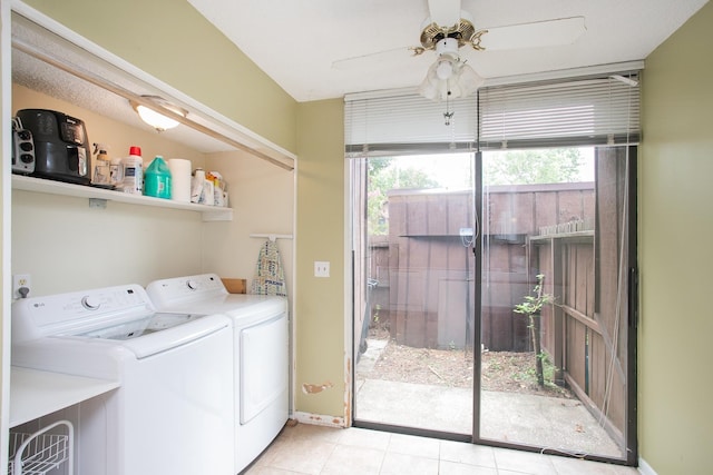 washroom featuring ceiling fan, washing machine and dryer, and light tile patterned floors