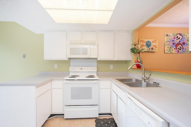 kitchen with sink, crown molding, white cabinets, white appliances, and light tile patterned flooring