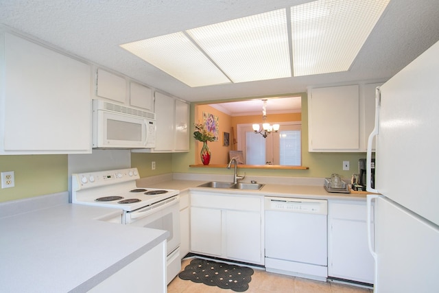 kitchen with ornamental molding, sink, decorative light fixtures, an inviting chandelier, and white appliances