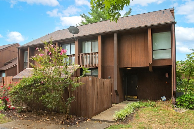 view of front of property with a balcony