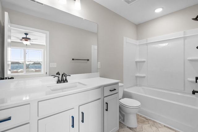 full bathroom featuring ceiling fan, toilet, shower / bath combination, visible vents, and vanity