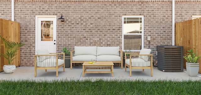 view of patio with fence, central AC unit, and an outdoor living space