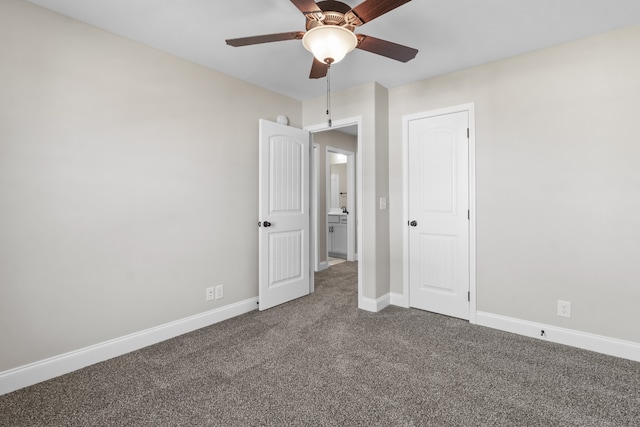 unfurnished bedroom with carpet floors, baseboards, and a ceiling fan